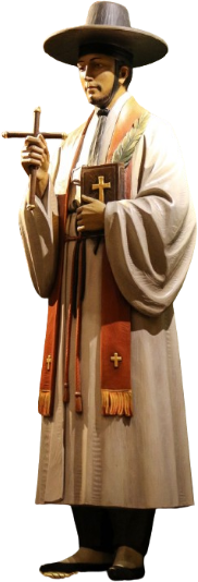 Carved and painted statue of St Andrew Kim Taegon in Korean hanbok and a wide-brimmed gat, holding a cross, a book and a martyr's palm